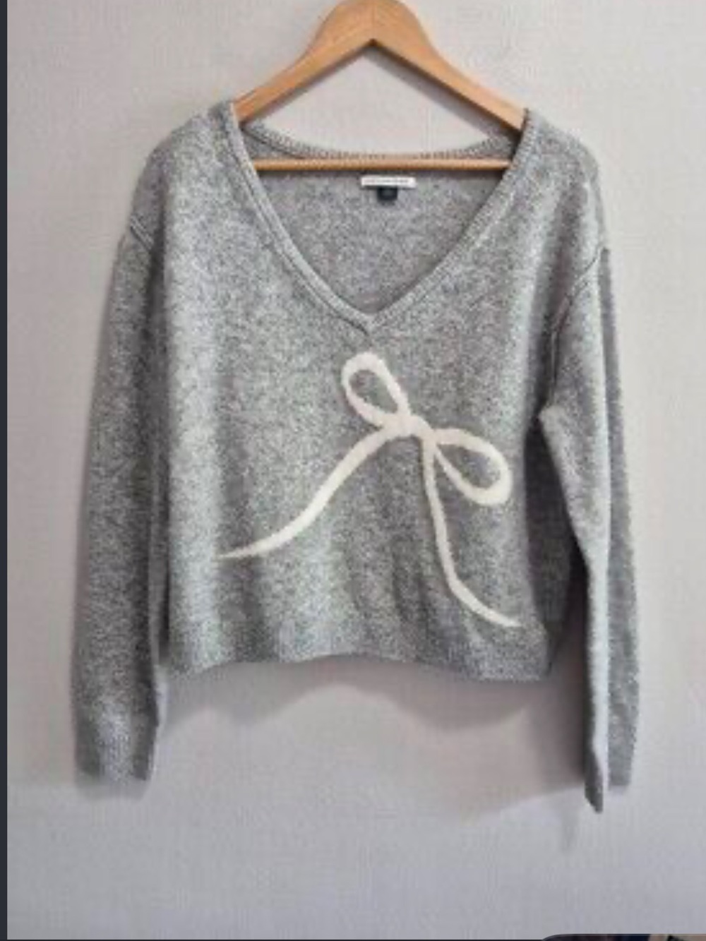 American Eagle Outfitters Gray V‑Neck Sweater with Cream Bow